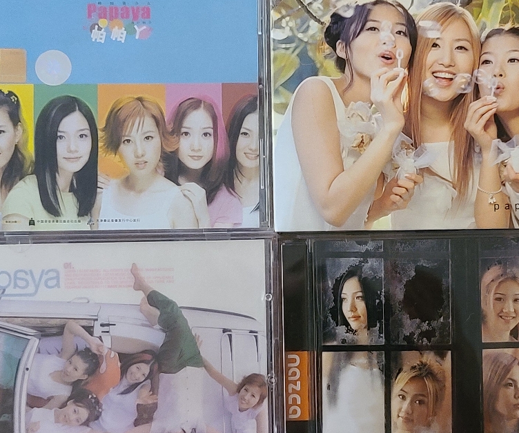 8 albums of various K-Pop Girl Groups