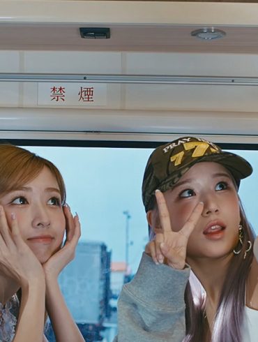 2 members of Limelight are posing cutely for a selfie in an RV