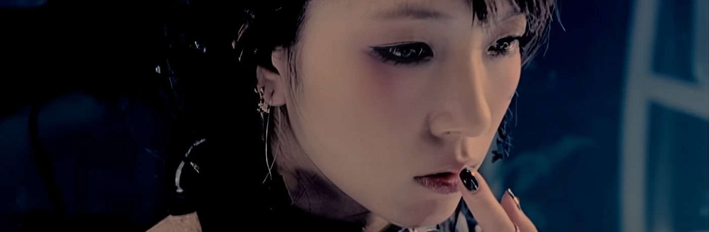 K-Pop singer Boa is pressing a finger to her lips